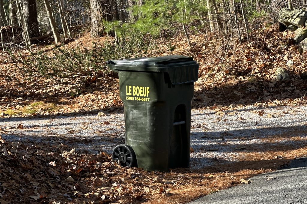 LeBoeuf garbage or recycling bin sitting at a rural curb in New England.