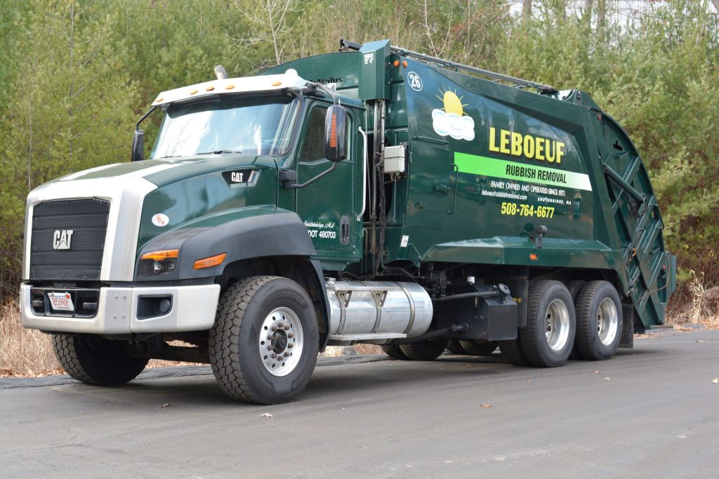 Rear load trucks in the waste management industry feature a rear opening where hydraulic systems manually load or lift waste.